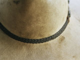 Close View Detail of the Hat Band on a Dirty Cowboy Hat