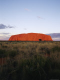 View of Ayers Rock Under a Purplish Twilight Sky