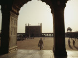 A Man Walks into the Courtyard of the Jama Masjid  or Friday Mosque  Built Between 1644