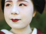 A Portrait of a Kimono-Clad Geisha