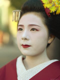 A Portrait of a Kimono-Clad Geisha
