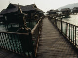Walkway to Malaysian-Style Luxury Resort Villas on Stilts