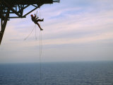 Remote Access Technicians Dangle off Ropes on an Oil Rig