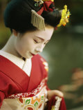 A Portrait of a Kimono-Clad Geisha