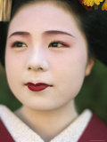 A Portrait of a Kimono-Clad Geisha