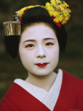 A Portrait of a Kimono-Clad Geisha