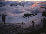 Dawn's Light Finds Mountaineers Crossing a Snow-Crusted Ridge of Mt Hood  Oregon
