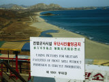 A Warning Sign Near Mined Beaches in an Off-Limits Zone