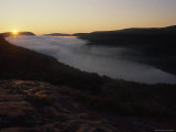 Sun Peeks over the Horizon at Lake of the Clouds in Michigan's Upper Peninsula