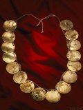 Enlarged Holes in the Golden Discs of a Restored Necklace Indicate Long Wear by the Warrior-Priest