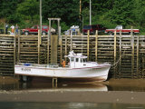 A Fishing Boat High-And-Dry at Low Tide