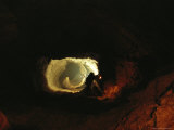 Cavers at the Top of a 100-Meter Pit at About 200 Meters Depth