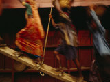 Male and Female Porters Carry Baskets of Sand Out of a Ship