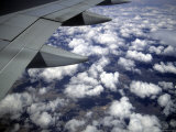 Close View of a Plane's Wing in Flight