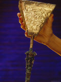 This Golden Rattle Depicting the Beating of a Prisoner was Found in the Warrior-Priests Right Hand