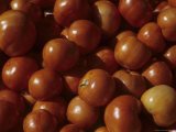 A Pile of Tomatoes Stand Waiting to be Bought at a Farmer's Market  Salzburg  Austria