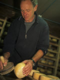 A Man Washes Cheese with Salt Water in During the Ageing Process  Pontresina  Switzerland