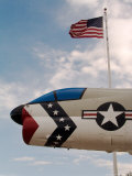 Fighter Jet and Flag along US Highway 50  Fallon  Nevada  USA