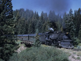 A Steam Engine Chugs Through a Mountain Pass in the Rockies  Cumbres Pass  Colorado