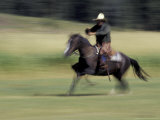 Cowboy and Horse at Hartgrave Ranch  Montana  USA