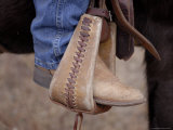 A Close-up of a Cowboy Boot in a Stirrup in the Nebraska Sandhills