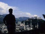 A Man Stands Admiring the Overlook of the City  Salzburg  Austria