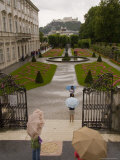 Tourists Wander Through the Bishop's Gardens in Salzburg in the Rain  Salzburg  Austria