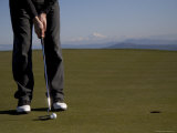A Man Golfs in February in British Columbia