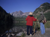 A Baby Boomer Couple Admire the View of the Maroon Bells  Aspen  Colorado