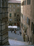 A Street Scene at the Foot of the Siena Cathedral