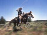 Cowboy Riding Through the Desert of Central Oregon  USA