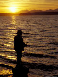 Silhouette of Fisherman at Lincoln Park  Seattle  Washington  USA