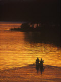 Canoers on Lake Metigoshe at Sunset  North Dakota  USA
