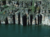 Cliffs Eroding into Muddy Water