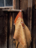 Chaps Hang on Wooden Ranch Outbuilding