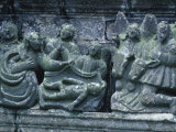 Religious Stone Carving of People on a Church