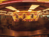 Fun on a Spinning Carousel at Night