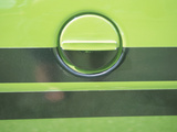 Vintage Gas Tank on a Green Classic Car