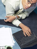 Businessman Working on Laptop on His Desk