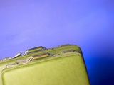 Two Green Vintage Suitcases with Travel Tags