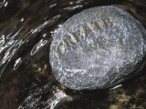 Create Written on Rock in Flowing Water