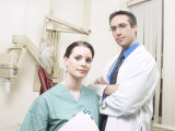 Dentist and Assistant in Office
