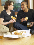 Couple Eating Pizza and Drinking Beer on Moving Day