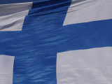 Close-up of the Flag of Finland on White Fabric with a Blue Cross