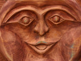 Close-up of a Carved Face in Wood