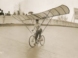 Grinning Cyclist Tries to Get His Glider Airborne at the Parc des Princes Stadium Paris