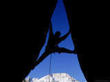 Silhouette of Man Rock Climbing on Split Rock  CA