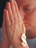 Woman Praying with Money Rosary