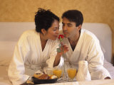 Vacationing Couple Enjoy Room Service Breakfast