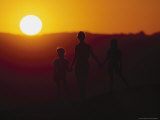 People Strolling with Sunset Behind  Muley Pt  UT